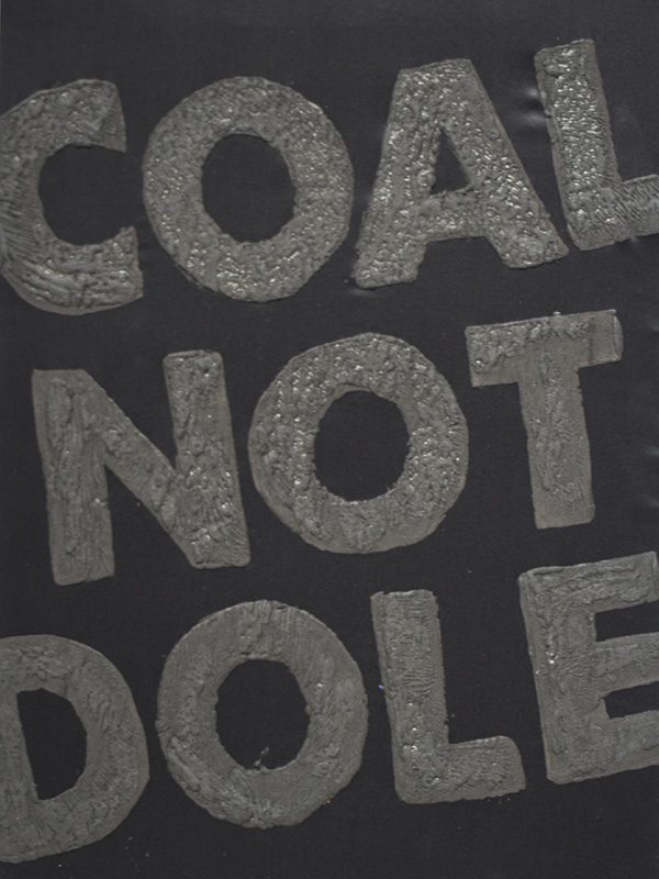 Coal not dole on fabric