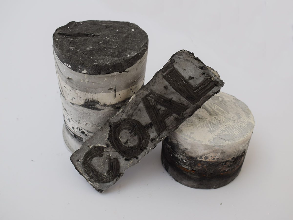 Plaster column pieces with coal impression 
