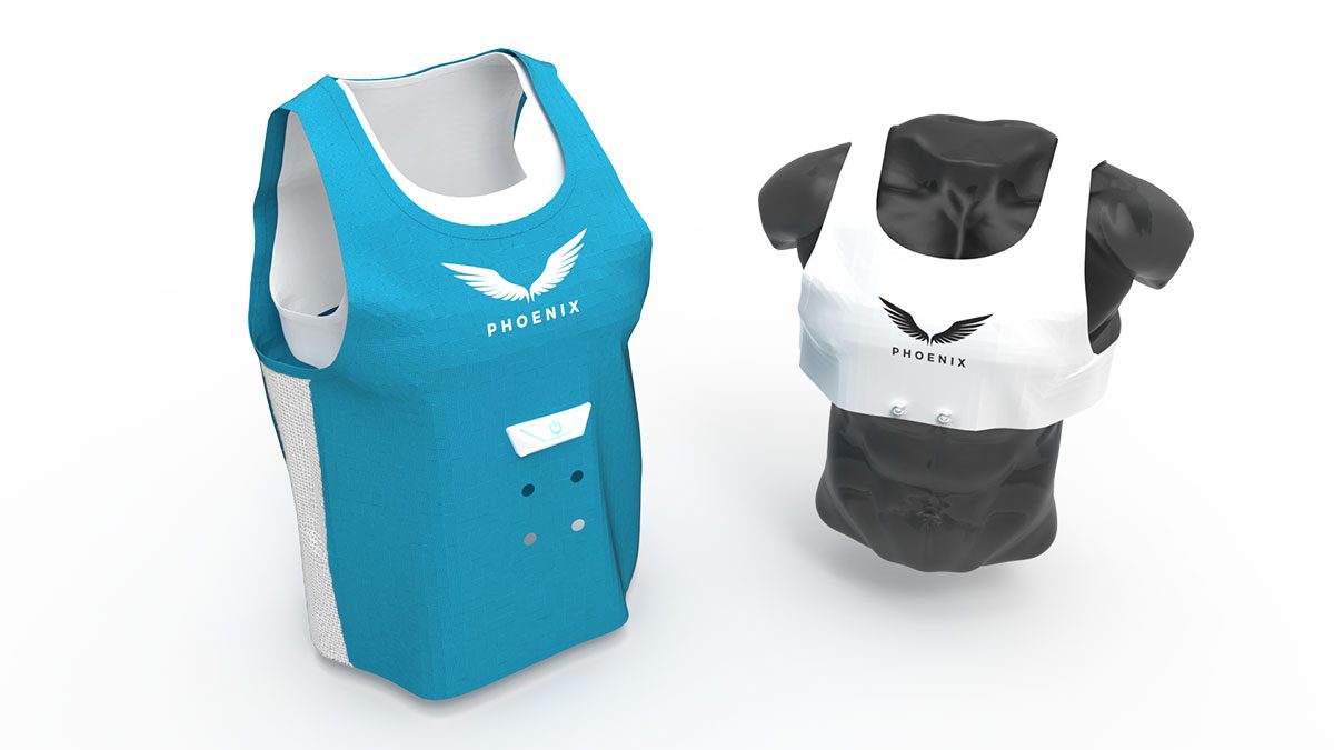 Within the image are two rendered vests. The vest on the left is freestanding and has an inner layer of a white colour and an outer layer of a light blue colour. The outer layer has the Phoenix logo on it that looks like Phoenix wings and also has the central panel device on the front, several sizing holes on the front, and on the side a white breathability mesh. The model on the right of the picture is the inner vest model that is pictured on top of a male mannequin torso that is made out of glossy black plastic. The inner vest also has the phoenix logo on it in black and has two popper holes on the lower center of the inner vest.